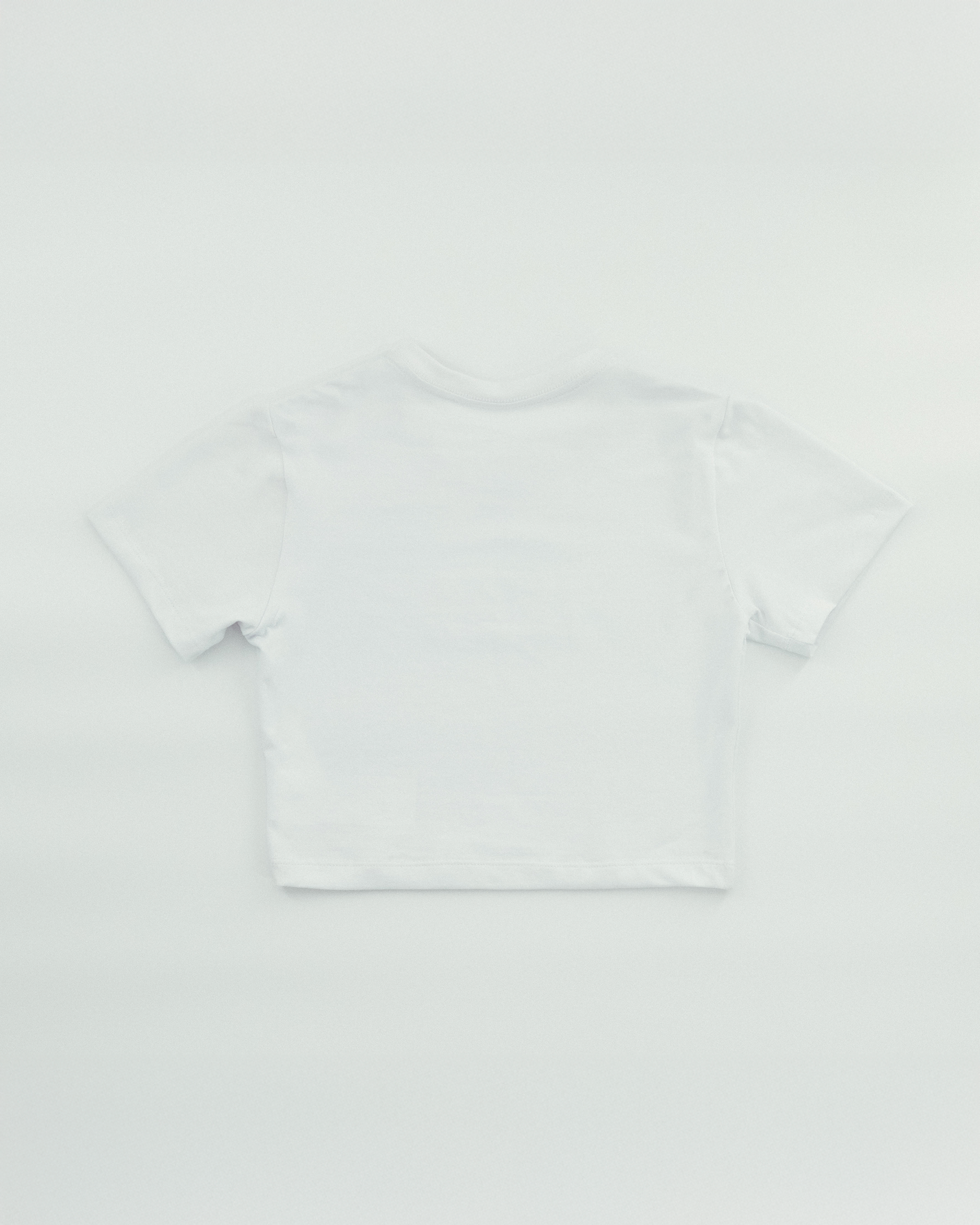 AWAKENING Baby tee White